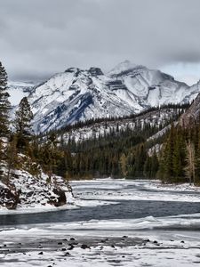 Preview wallpaper mountains, rocks, snow, lake, snowy, trees