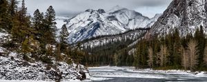 Preview wallpaper mountains, rocks, snow, lake, snowy, trees