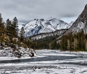 Preview wallpaper mountains, rocks, snow, lake, snowy, trees