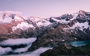 Preview wallpaper mountains, rocks, snow, snowy, lake, sky