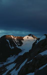 Preview wallpaper mountains, rocks, snow, snowy, sky, stones