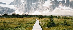 Preview wallpaper mountains, rocks, snowy, path, clouds