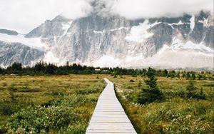 Preview wallpaper mountains, rocks, snowy, path, clouds