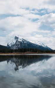 Preview wallpaper mountains, rocks, snowy, trees, reflection