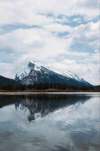 Preview wallpaper mountains, rocks, snowy, trees, reflection