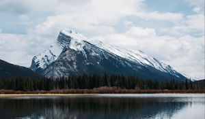Preview wallpaper mountains, rocks, snowy, trees, reflection