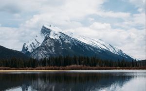 Preview wallpaper mountains, rocks, snowy, trees, reflection