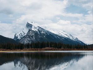 Preview wallpaper mountains, rocks, snowy, trees, reflection
