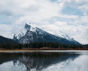 Preview wallpaper mountains, rocks, snowy, trees, reflection