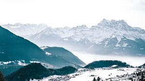 Preview wallpaper mountains, rocks, snowy, snow, winter