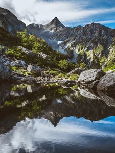 Preview wallpaper mountains, rocks, stones, lake, reflection