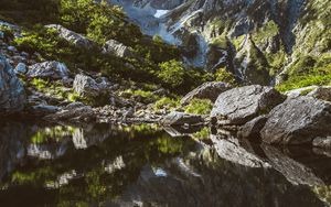 Preview wallpaper mountains, rocks, stones, lake, reflection