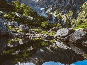 Preview wallpaper mountains, rocks, stones, lake, reflection