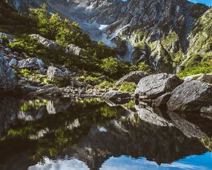 Preview wallpaper mountains, rocks, stones, lake, reflection
