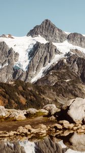 Preview wallpaper mountains, rocks, stones, sky, trees