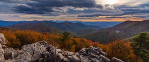 Preview wallpaper mountains, rocks, stones, sunset, landscape, nature