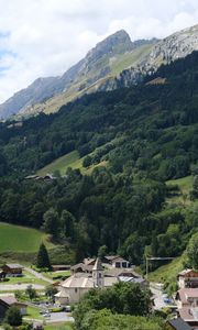 Preview wallpaper mountains, rocks, trees, buildings, houses, nature