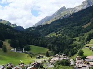 Preview wallpaper mountains, rocks, trees, buildings, houses, nature