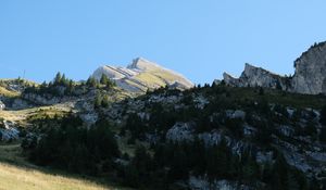 Preview wallpaper mountains, rocks, trees, nature, shadows, sky