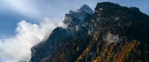 Preview wallpaper mountains, rocks, trees, fog, clouds