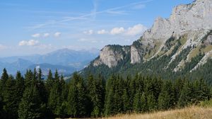Preview wallpaper mountains, rocks, trees, clouds