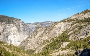 Preview wallpaper mountains, rocks, trees, cliff, river