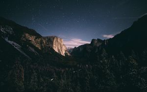 Preview wallpaper mountains, rocks, trees, forest, starry sky, night