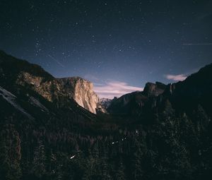 Preview wallpaper mountains, rocks, trees, forest, starry sky, night