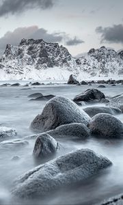 Preview wallpaper mountains, rocks, water, snow, sea, coast
