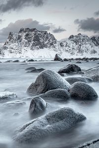 Preview wallpaper mountains, rocks, water, snow, sea, coast