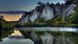 Preview wallpaper mountains, rocks, water smooth surface, evening, silence