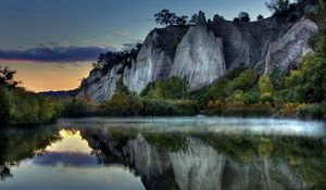 Preview wallpaper mountains, rocks, water smooth surface, evening, silence