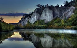 Preview wallpaper mountains, rocks, water smooth surface, evening, silence