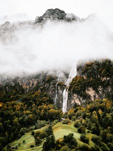 Preview wallpaper mountains, rocks, waterfall, trees, fog, clouds