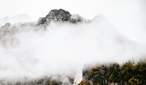 Preview wallpaper mountains, rocks, waterfall, trees, fog, clouds