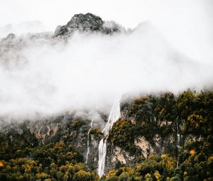 Preview wallpaper mountains, rocks, waterfall, trees, fog, clouds