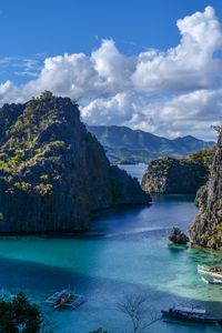Preview wallpaper mountains, sea, boats, nature, sky, clouds