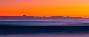 Preview wallpaper mountains, sea, dusk, landscape, blur