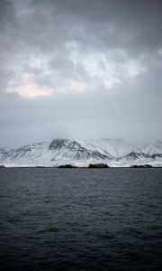 Preview wallpaper mountains, sea, fog, snow, horizon, reykjavik, iceland