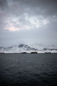 Preview wallpaper mountains, sea, fog, snow, horizon, reykjavik, iceland
