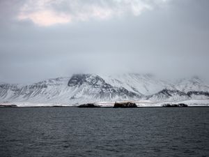 Preview wallpaper mountains, sea, fog, snow, horizon, reykjavik, iceland