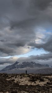 Preview wallpaper mountains, silhouette, clouds, overcast, loneliness, solitude