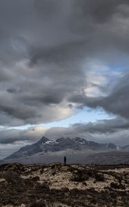 Preview wallpaper mountains, silhouette, clouds, overcast, loneliness, solitude