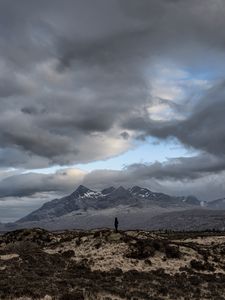 Preview wallpaper mountains, silhouette, clouds, overcast, loneliness, solitude