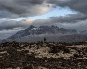 Preview wallpaper mountains, silhouette, clouds, overcast, loneliness, solitude