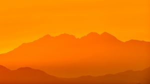 Preview wallpaper mountains, silhouette, rocks, orange