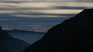 Preview wallpaper mountains, silhouettes, clouds, landscape, nature, twilight, dark