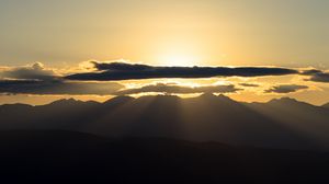 Preview wallpaper mountains, silhouettes, clouds, sunlight, landscape