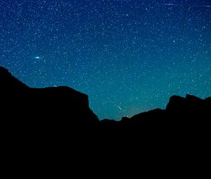 Preview wallpaper mountains, silhouettes, starry sky, stars, dark