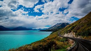 Preview wallpaper mountains, sky, grass, sea, rail